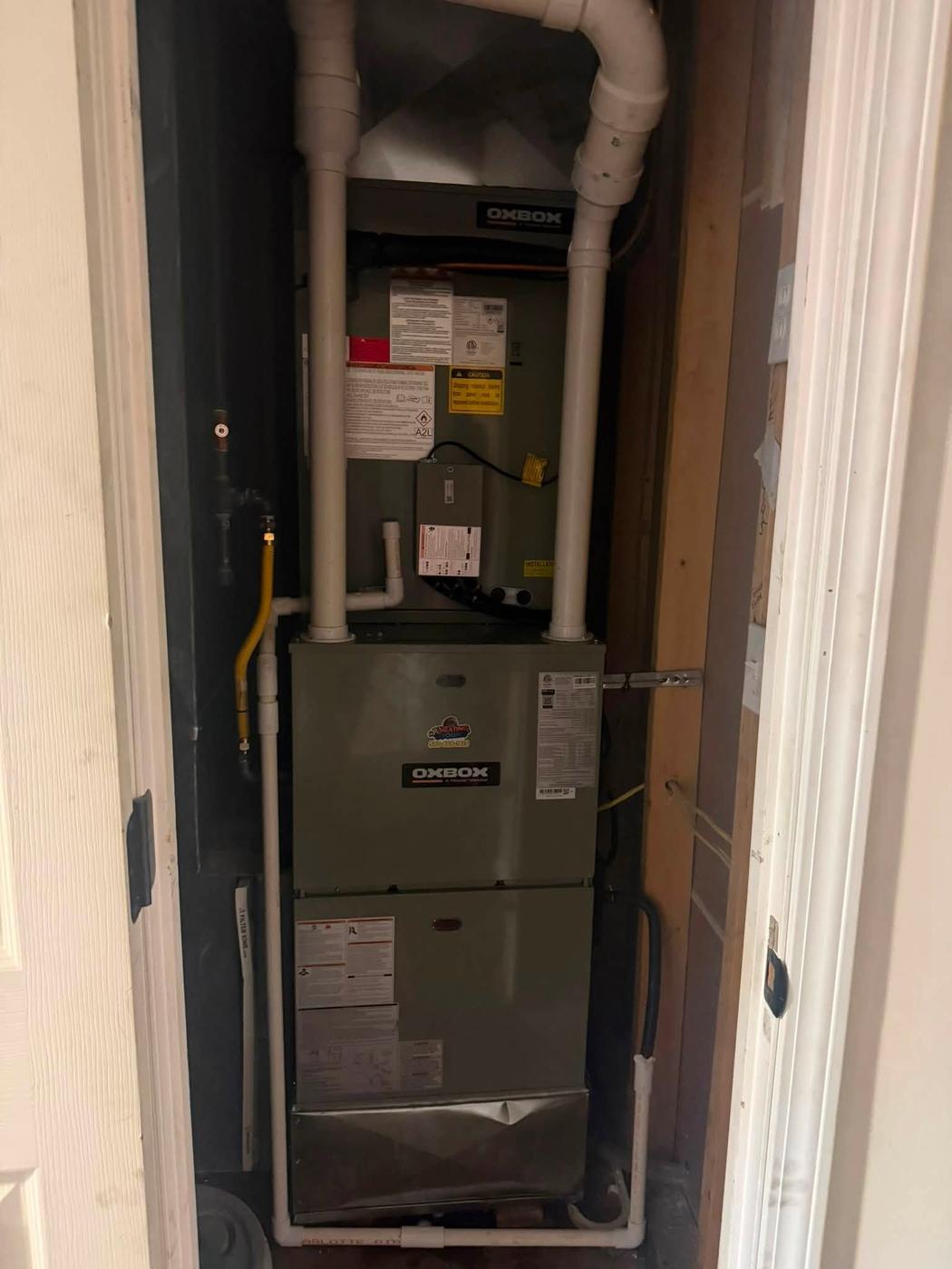 Oxbox furnace fitted into a narrow utility closet